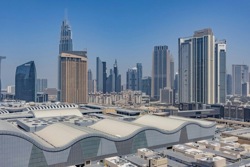 An aerial view of a city with tall buildings